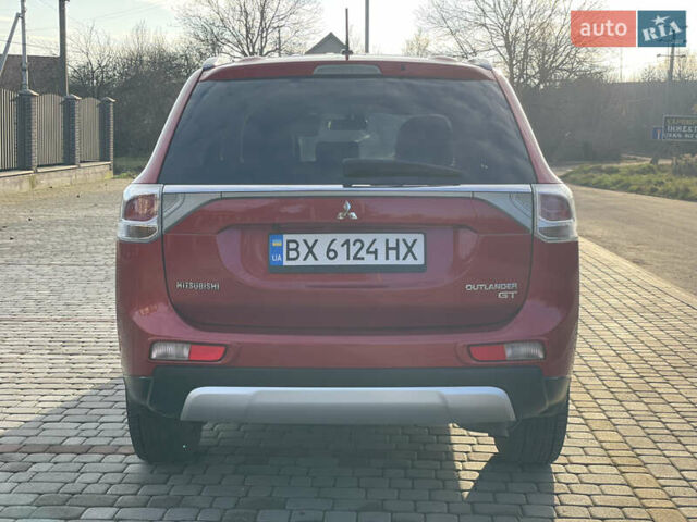 Красный Мицубиси Аутлендер, объемом двигателя 3 л и пробегом 230 тыс. км за 13900 $, фото 12 на Automoto.ua