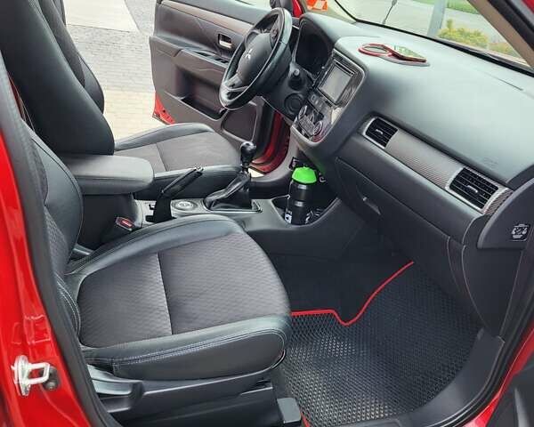 Красный Мицубиси Аутлендер, объемом двигателя 2.2 л и пробегом 225 тыс. км за 14600 $, фото 5 на Automoto.ua