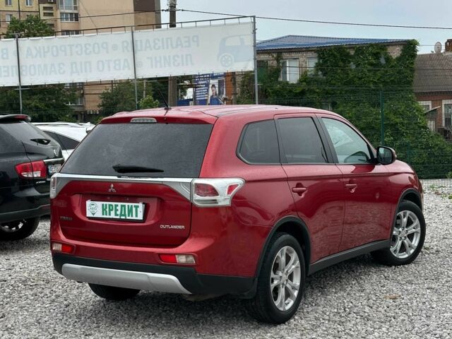 Красный Мицубиси Аутлендер, объемом двигателя 2.4 л и пробегом 213 тыс. км за 11900 $, фото 4 на Automoto.ua
