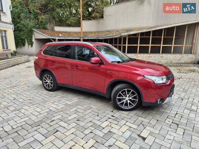 Красный Мицубиси Аутлендер, объемом двигателя 3 л и пробегом 119 тыс. км за 14000 $, фото 5 на Automoto.ua