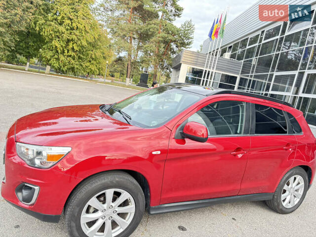 Красный Мицубиси Аутлендер, объемом двигателя 2 л и пробегом 210 тыс. км за 13500 $, фото 6 на Automoto.ua