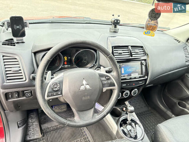 Красный Мицубиси Аутлендер, объемом двигателя 2 л и пробегом 210 тыс. км за 13500 $, фото 14 на Automoto.ua