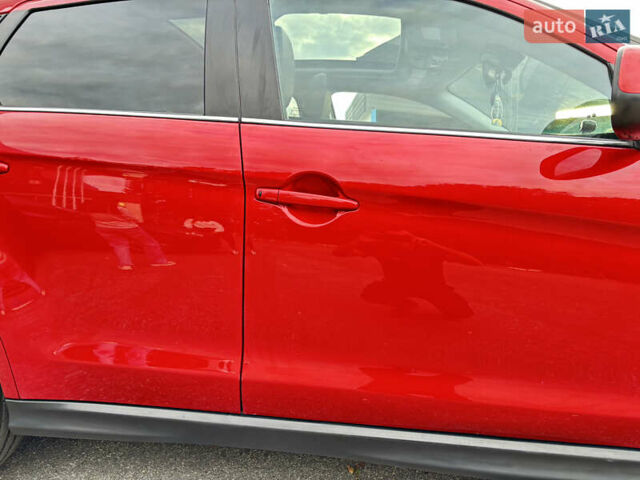 Красный Мицубиси Аутлендер, объемом двигателя 2 л и пробегом 210 тыс. км за 13500 $, фото 4 на Automoto.ua