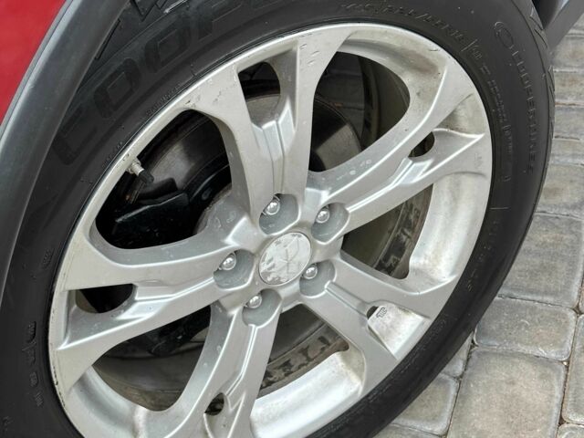 Красный Мицубиси Аутлендер, объемом двигателя 2.4 л и пробегом 213 тыс. км за 11900 $, фото 3 на Automoto.ua