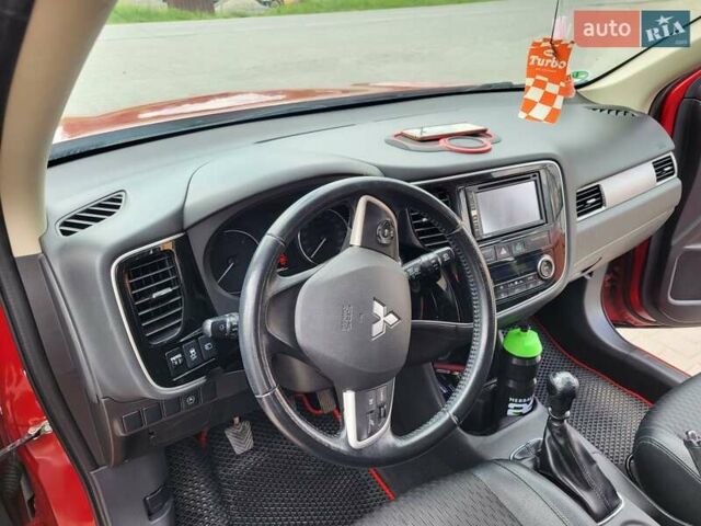 Красный Мицубиси Аутлендер, объемом двигателя 2.2 л и пробегом 225 тыс. км за 14600 $, фото 7 на Automoto.ua