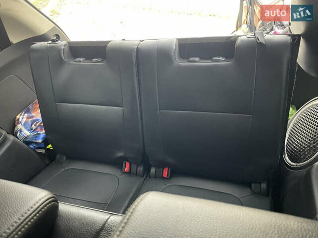 Червоний Міцубісі Аутлендер, об'ємом двигуна 2.36 л та пробігом 149 тис. км за 12500 $, фото 10 на Automoto.ua