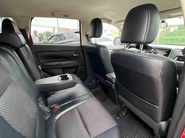 Красный Мицубиси Аутлендер, объемом двигателя 2.4 л и пробегом 213 тыс. км за 11900 $, фото 6 на Automoto.ua