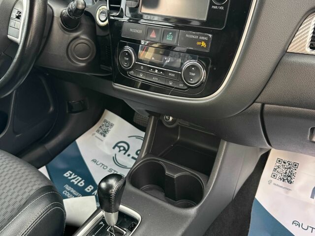 Красный Мицубиси Аутлендер, объемом двигателя 2.4 л и пробегом 213 тыс. км за 11900 $, фото 12 на Automoto.ua