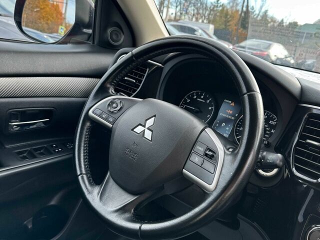 Красный Мицубиси Аутлендер, объемом двигателя 2.4 л и пробегом 213 тыс. км за 11900 $, фото 13 на Automoto.ua