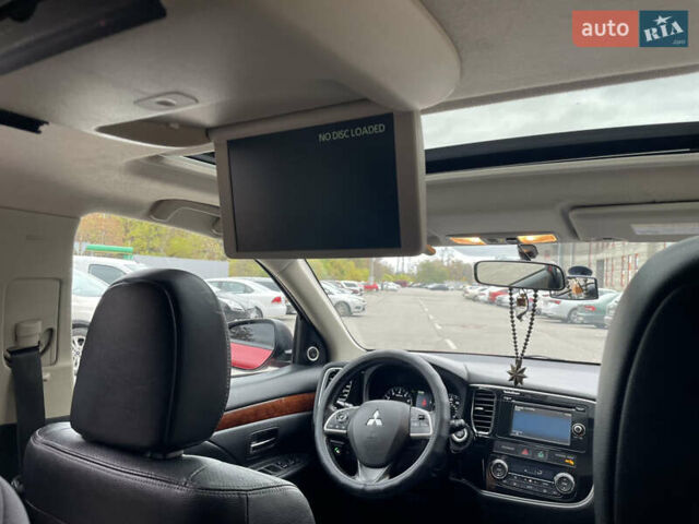 Червоний Міцубісі Аутлендер, об'ємом двигуна 2.36 л та пробігом 149 тис. км за 12500 $, фото 11 на Automoto.ua