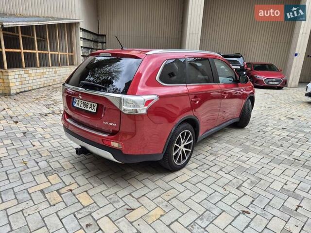 Красный Мицубиси Аутлендер, объемом двигателя 3 л и пробегом 119 тыс. км за 14000 $, фото 4 на Automoto.ua