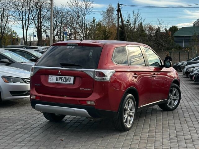 Красный Мицубиси Аутлендер, объемом двигателя 2.4 л и пробегом 213 тыс. км за 11900 $, фото 2 на Automoto.ua