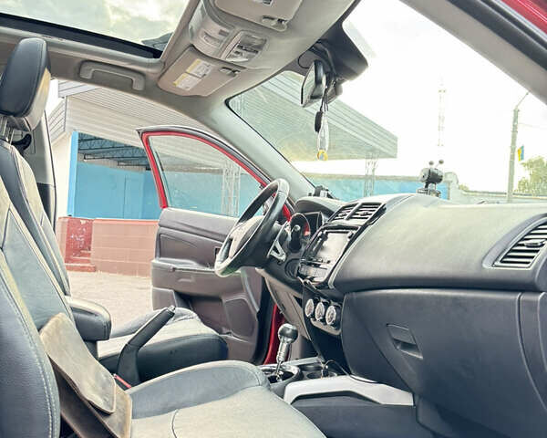 Красный Мицубиси Аутлендер, объемом двигателя 2 л и пробегом 210 тыс. км за 13500 $, фото 15 на Automoto.ua