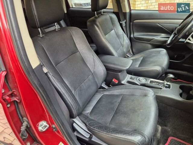 Красный Мицубиси Аутлендер, объемом двигателя 3 л и пробегом 119 тыс. км за 14000 $, фото 10 на Automoto.ua