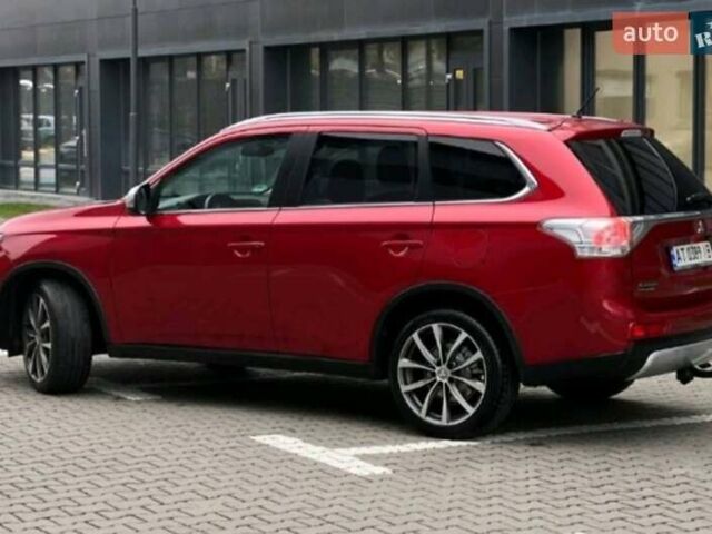 Красный Мицубиси Аутлендер, объемом двигателя 2.2 л и пробегом 225 тыс. км за 14600 $, фото 1 на Automoto.ua