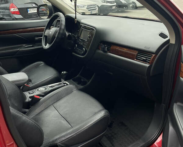 Червоний Міцубісі Аутлендер, об'ємом двигуна 2.36 л та пробігом 149 тис. км за 12500 $, фото 7 на Automoto.ua