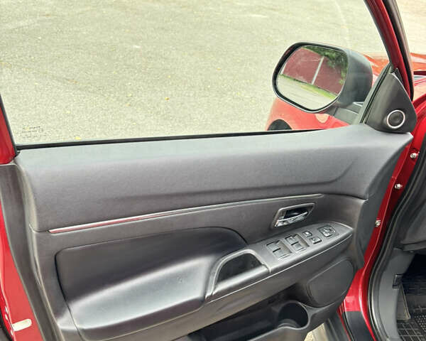 Красный Мицубиси Аутлендер, объемом двигателя 2 л и пробегом 210 тыс. км за 13500 $, фото 10 на Automoto.ua