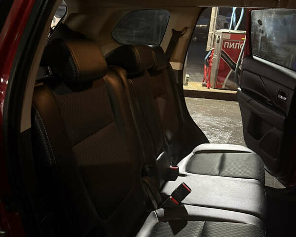 Червоний Міцубісі Аутлендер, об'ємом двигуна 2.27 л та пробігом 238 тис. км за 15800 $, фото 13 на Automoto.ua