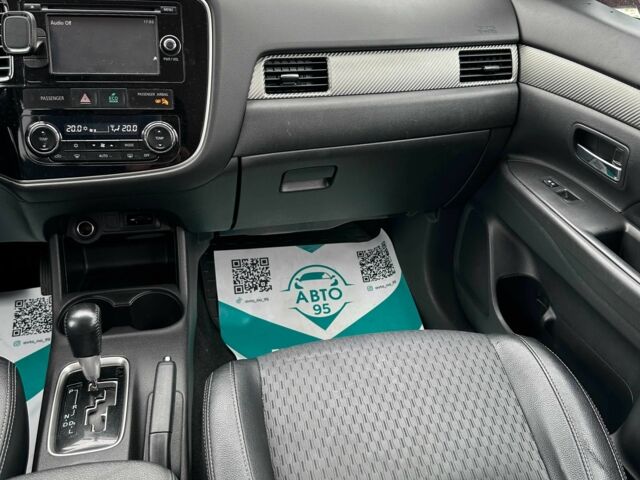 Красный Мицубиси Аутлендер, объемом двигателя 2.4 л и пробегом 213 тыс. км за 11900 $, фото 8 на Automoto.ua