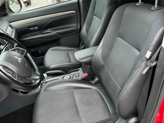 Красный Мицубиси Аутлендер, объемом двигателя 2.4 л и пробегом 213 тыс. км за 11900 $, фото 13 на Automoto.ua