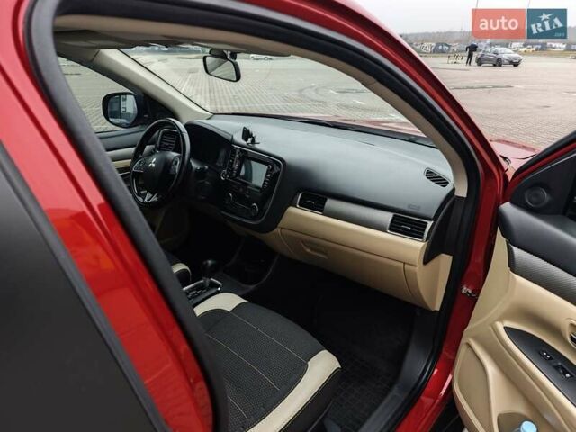 Красный Мицубиси Аутлендер, объемом двигателя 2.36 л и пробегом 123 тыс. км за 15300 $, фото 13 на Automoto.ua