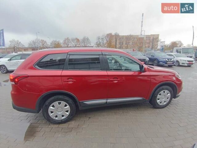 Красный Мицубиси Аутлендер, объемом двигателя 2.36 л и пробегом 172 тыс. км за 12300 $, фото 8 на Automoto.ua