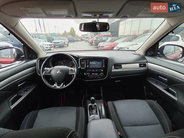 Красный Мицубиси Аутлендер, объемом двигателя 2.36 л и пробегом 172 тыс. км за 12300 $, фото 14 на Automoto.ua