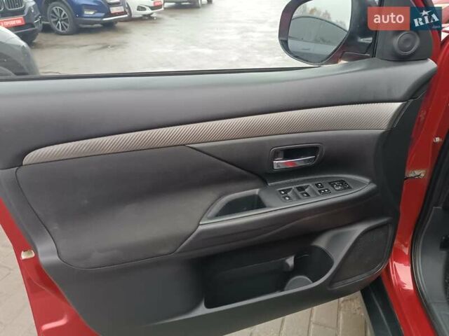 Красный Мицубиси Аутлендер, объемом двигателя 2.36 л и пробегом 172 тыс. км за 12300 $, фото 10 на Automoto.ua