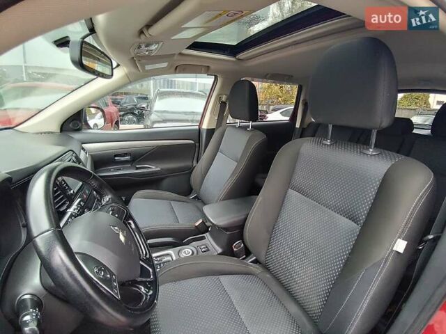 Красный Мицубиси Аутлендер, объемом двигателя 2.36 л и пробегом 172 тыс. км за 12300 $, фото 24 на Automoto.ua