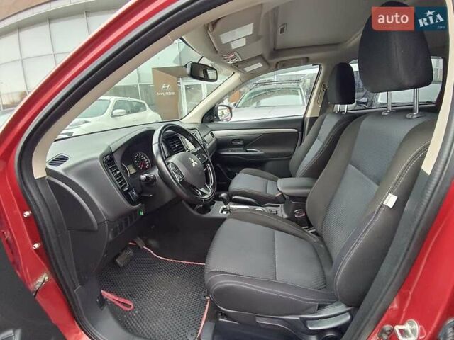 Красный Мицубиси Аутлендер, объемом двигателя 2.36 л и пробегом 172 тыс. км за 12300 $, фото 9 на Automoto.ua