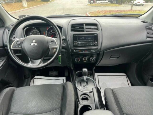 Червоний Міцубісі Аутлендер, об'ємом двигуна 2 л та пробігом 75 тис. км за 9000 $, фото 7 на Automoto.ua