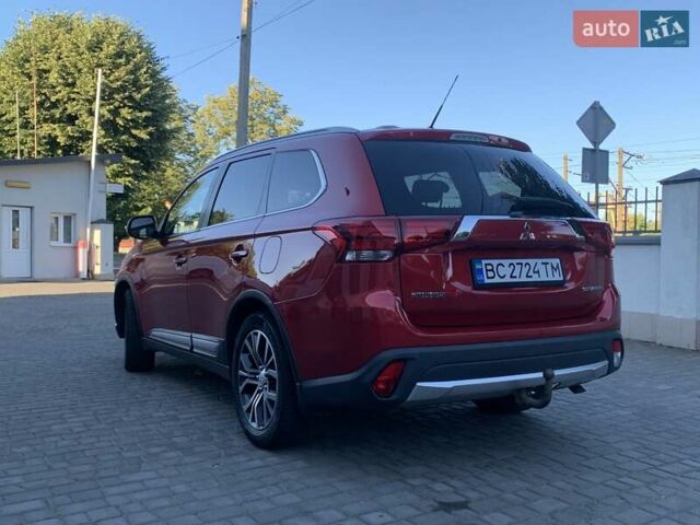 Червоний Міцубісі Аутлендер, об'ємом двигуна 2.27 л та пробігом 150 тис. км за 17600 $, фото 4 на Automoto.ua