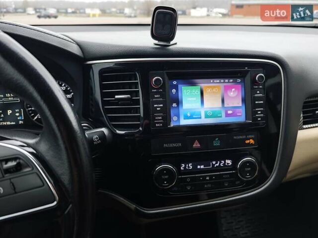 Красный Мицубиси Аутлендер, объемом двигателя 2.36 л и пробегом 123 тыс. км за 15300 $, фото 10 на Automoto.ua