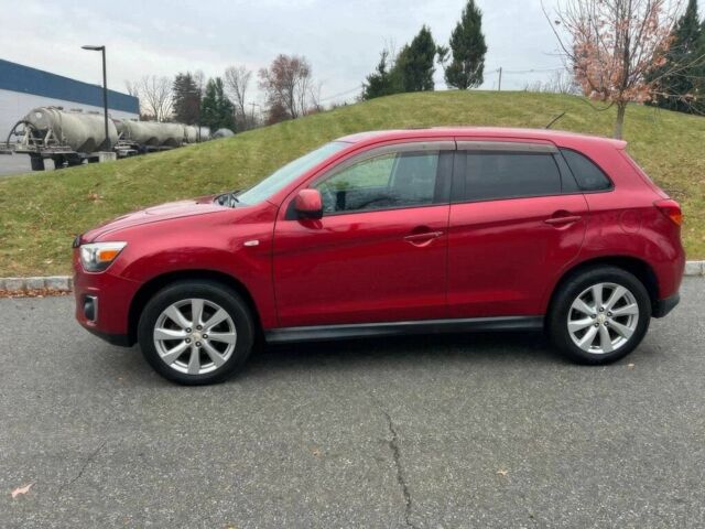 Червоний Міцубісі Аутлендер, об'ємом двигуна 2 л та пробігом 75 тис. км за 9000 $, фото 6 на Automoto.ua