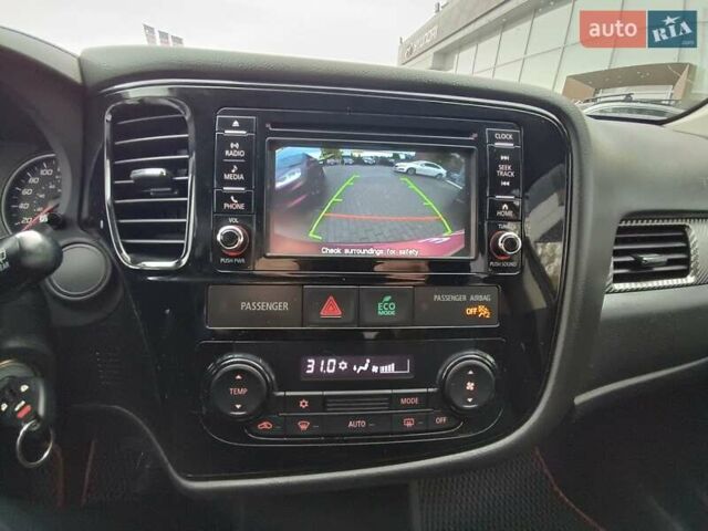 Красный Мицубиси Аутлендер, объемом двигателя 2.36 л и пробегом 172 тыс. км за 12300 $, фото 15 на Automoto.ua