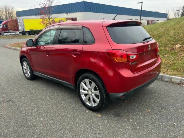 Червоний Міцубісі Аутлендер, об'ємом двигуна 2 л та пробігом 75 тис. км за 9000 $, фото 5 на Automoto.ua