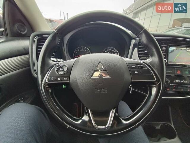 Красный Мицубиси Аутлендер, объемом двигателя 2.36 л и пробегом 172 тыс. км за 12300 $, фото 16 на Automoto.ua