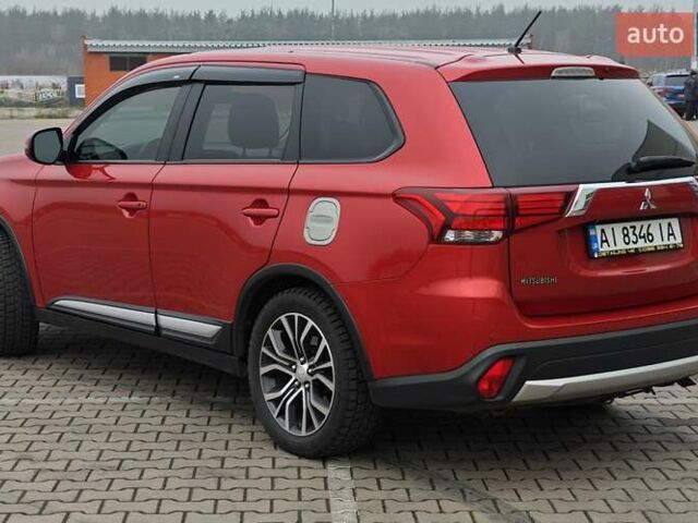 Красный Мицубиси Аутлендер, объемом двигателя 2.36 л и пробегом 123 тыс. км за 15300 $, фото 2 на Automoto.ua