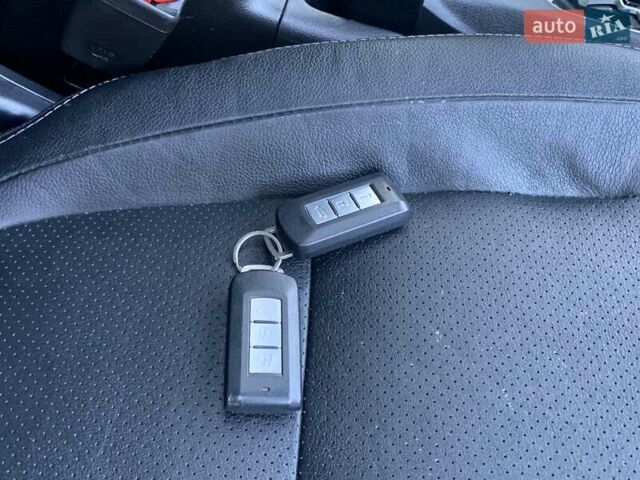 Червоний Міцубісі Аутлендер, об'ємом двигуна 2.27 л та пробігом 150 тис. км за 17600 $, фото 26 на Automoto.ua