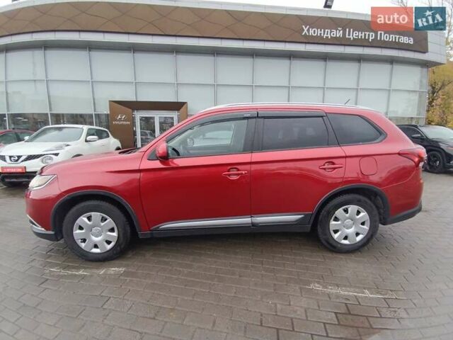 Красный Мицубиси Аутлендер, объемом двигателя 2.36 л и пробегом 172 тыс. км за 12300 $, фото 3 на Automoto.ua