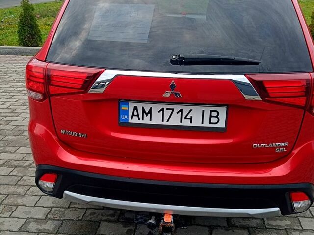 Червоний Міцубісі Аутлендер, об'ємом двигуна 2.4 л та пробігом 131 тис. км за 16300 $, фото 5 на Automoto.ua