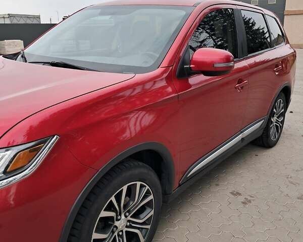 Мицубиси Аутлендер 2016 в Жашкове на Automoto.ua Красный Мицубиси Аутлендер, объемом двигателя 2.36 л и пробегом 270 тыс. км за 12500 $, фото 3 на Automoto.ua