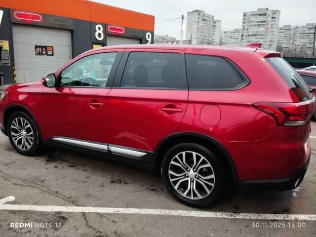 Червоний Міцубісі Аутлендер, об'ємом двигуна 2.4 л та пробігом 117 тис. км за 14000 $, фото 7 на Automoto.ua