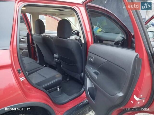 Красный Мицубиси Аутлендер, объемом двигателя 2.36 л и пробегом 118 тыс. км за 14000 $, фото 8 на Automoto.ua