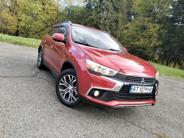 Красный Мицубиси Аутлендер, объемом двигателя 2.4 л и пробегом 185 тыс. км за 12200 $, фото 4 на Automoto.ua