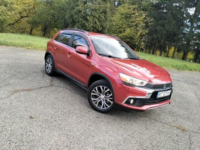 Красный Мицубиси Аутлендер, объемом двигателя 2.4 л и пробегом 185 тыс. км за 12200 $, фото 5 на Automoto.ua