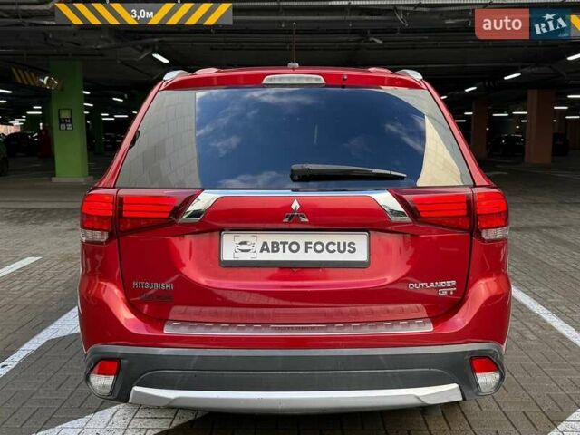 Красный Мицубиси Аутлендер, объемом двигателя 3 л и пробегом 167 тыс. км за 16990 $, фото 8 на Automoto.ua
