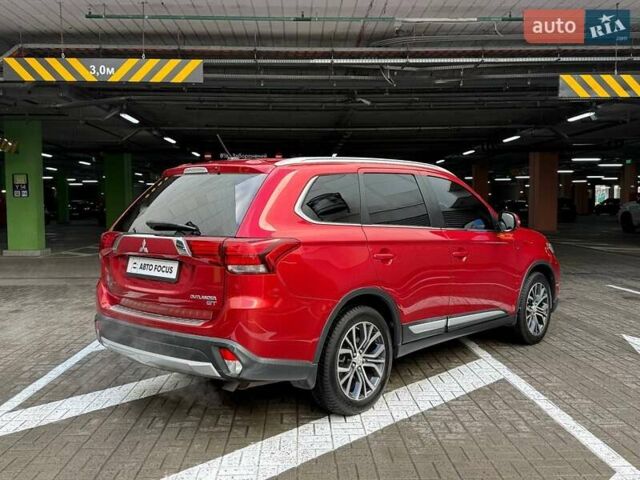 Красный Мицубиси Аутлендер, объемом двигателя 3 л и пробегом 167 тыс. км за 16990 $, фото 6 на Automoto.ua