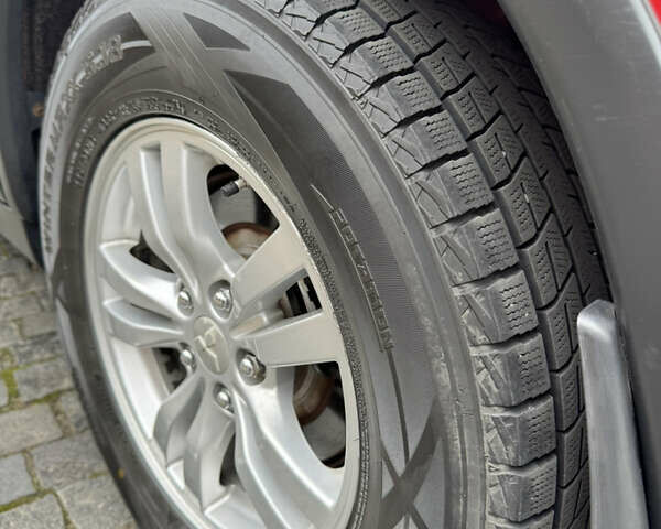 Красный Мицубиси Аутлендер, объемом двигателя 2.4 л и пробегом 225 тыс. км за 11900 $, фото 9 на Automoto.ua