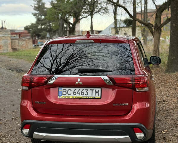 Червоний Міцубісі Аутлендер, об'ємом двигуна 2.36 л та пробігом 190 тис. км за 12000 $, фото 4 на Automoto.ua